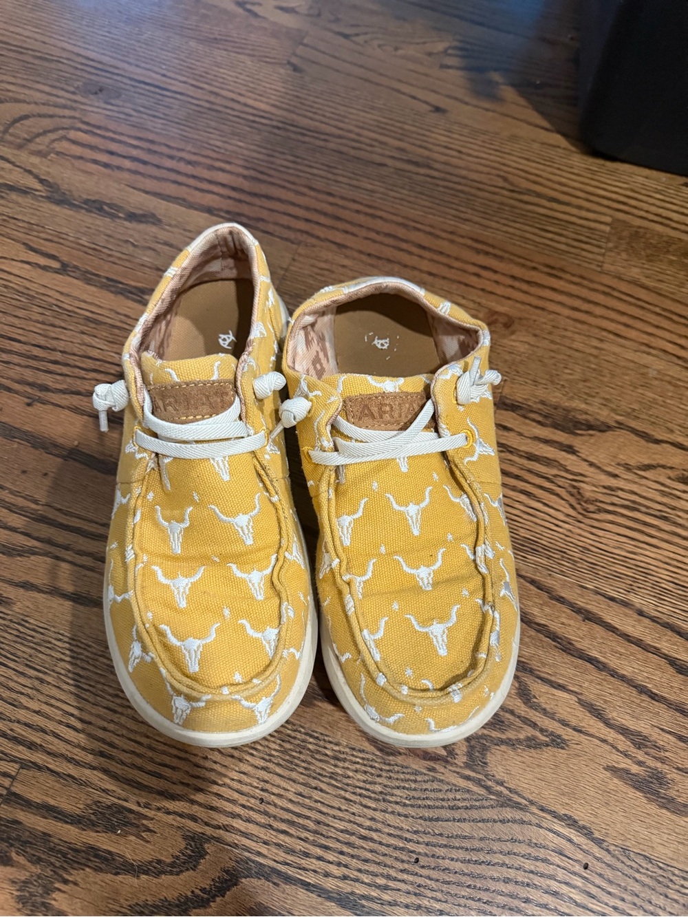 Ariat Yellow Canvas women’s slip ons  with White Steer Print